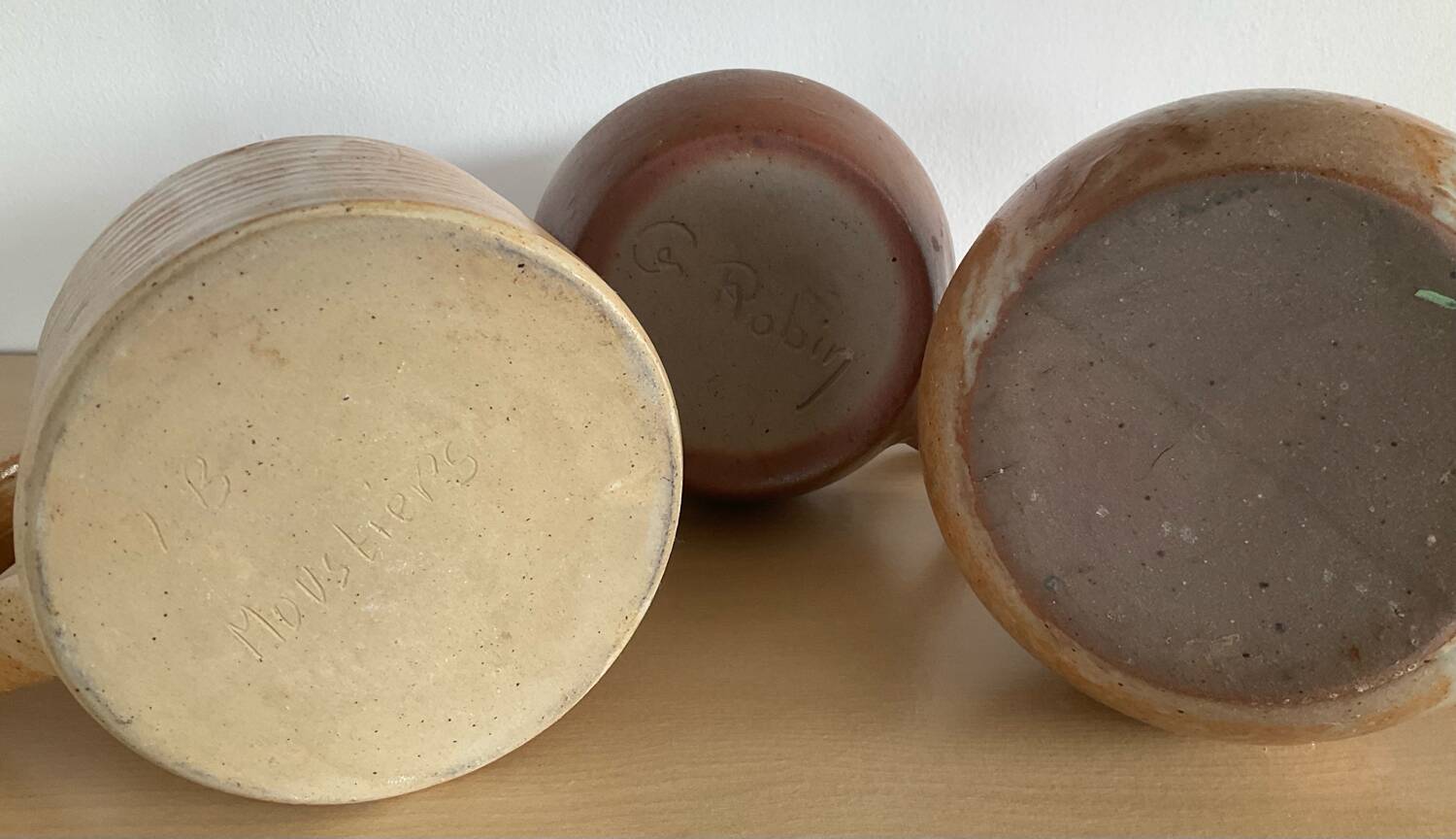 Trio of vintage stoneware jug vases
