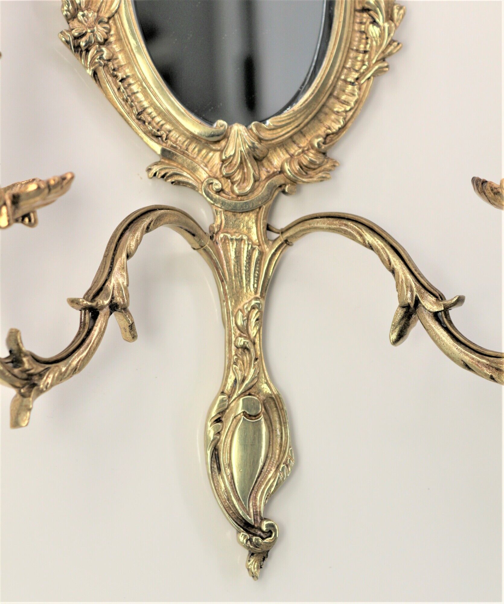 Pair of louis XV beveled mirror wall lamps in bronze by "Lucien Gau"