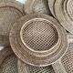 Set of round woven rattan and canework coasters