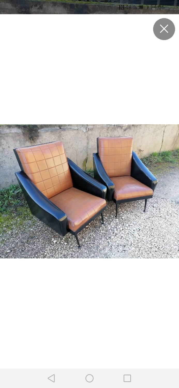 Pair of faux leather armchairs
