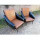 Paire de fauteuils en simili cuir