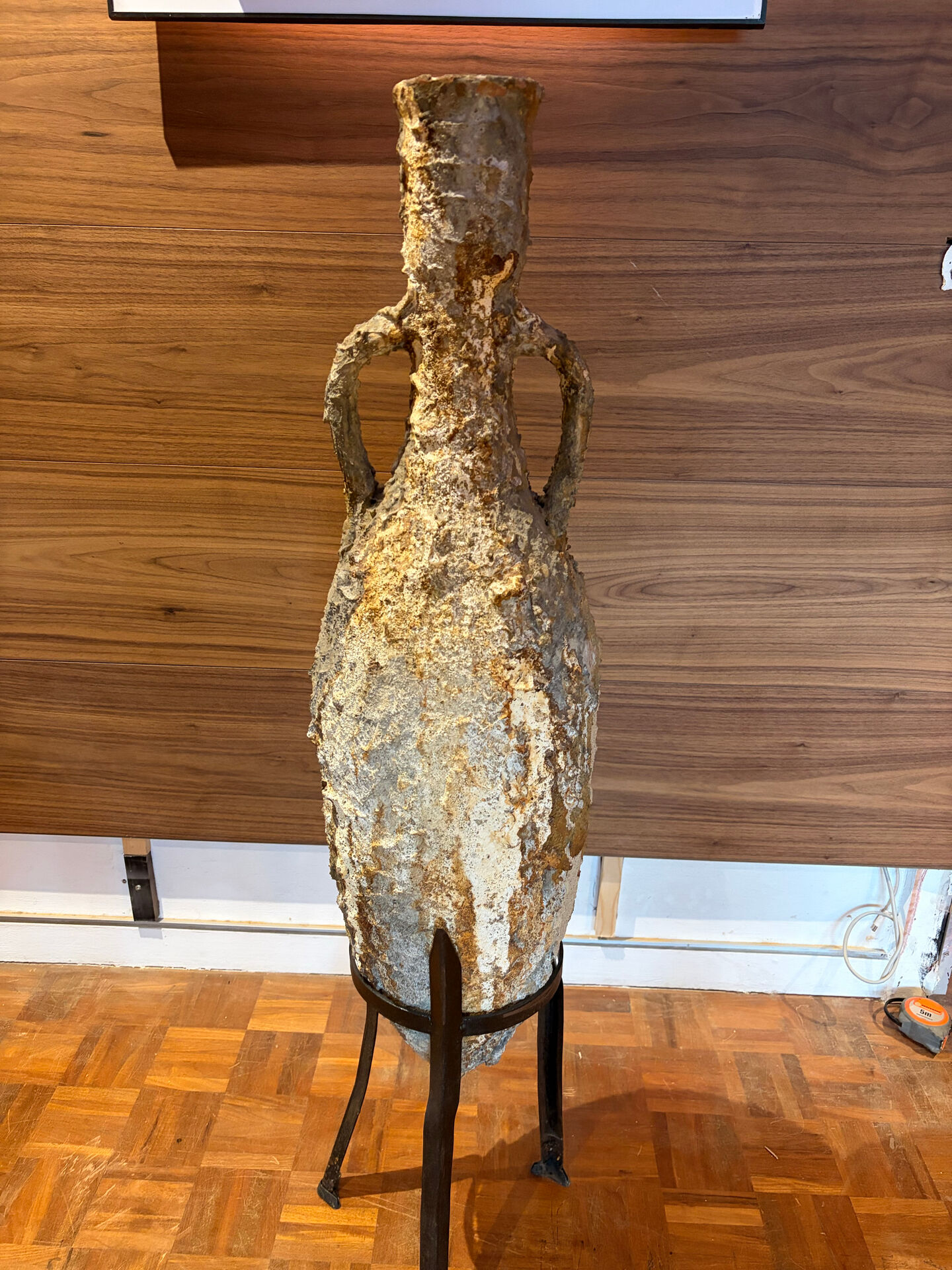 Genuine Roman amphora from marine excavation with its forged iron base.