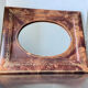 Antique leather framed mirror with gildings 30 cm x  24 cm