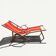 Vintage deck chair with red and orange striped fabric, original patina.