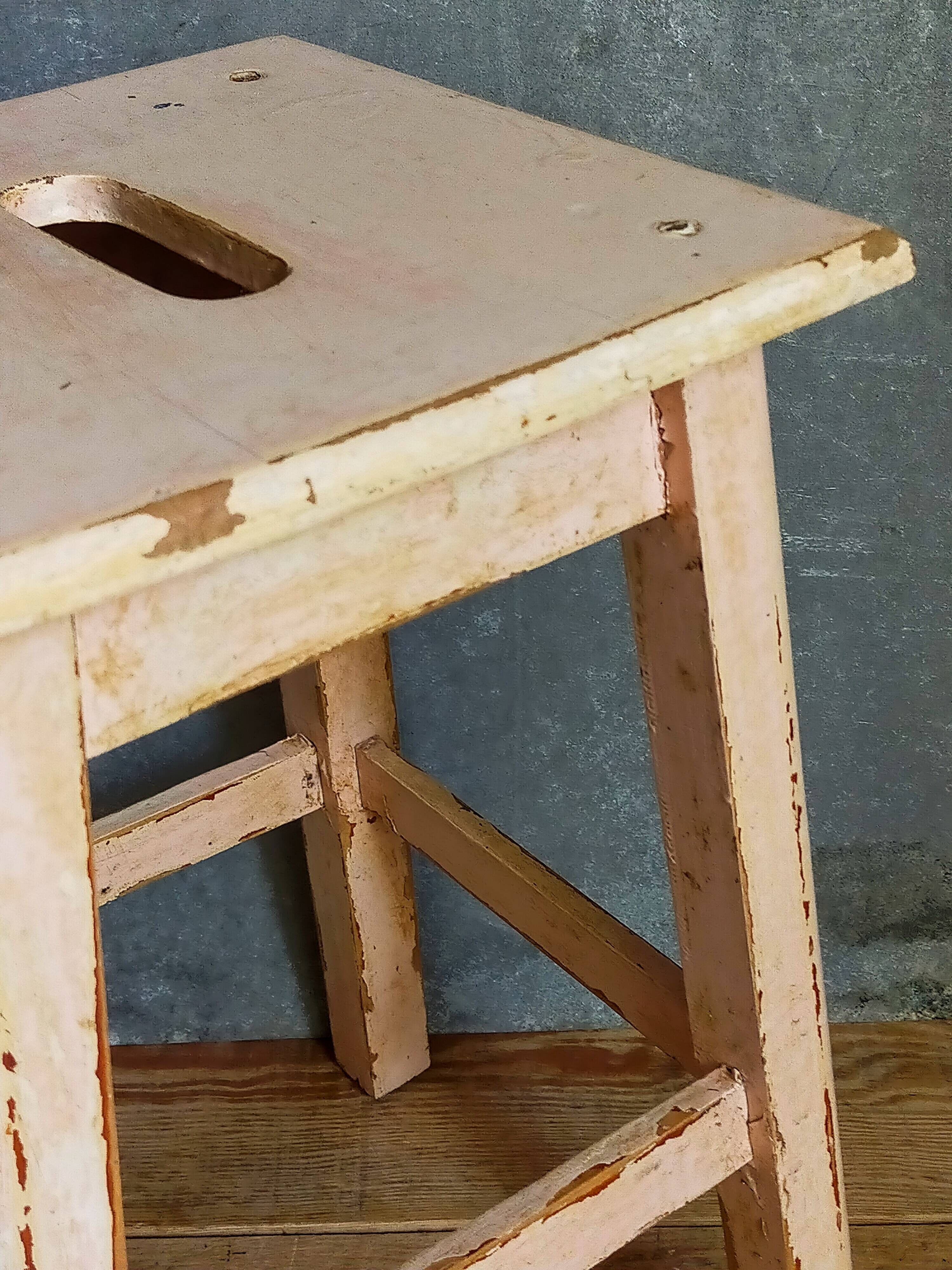 Antique workshop stool in patinated solid wood