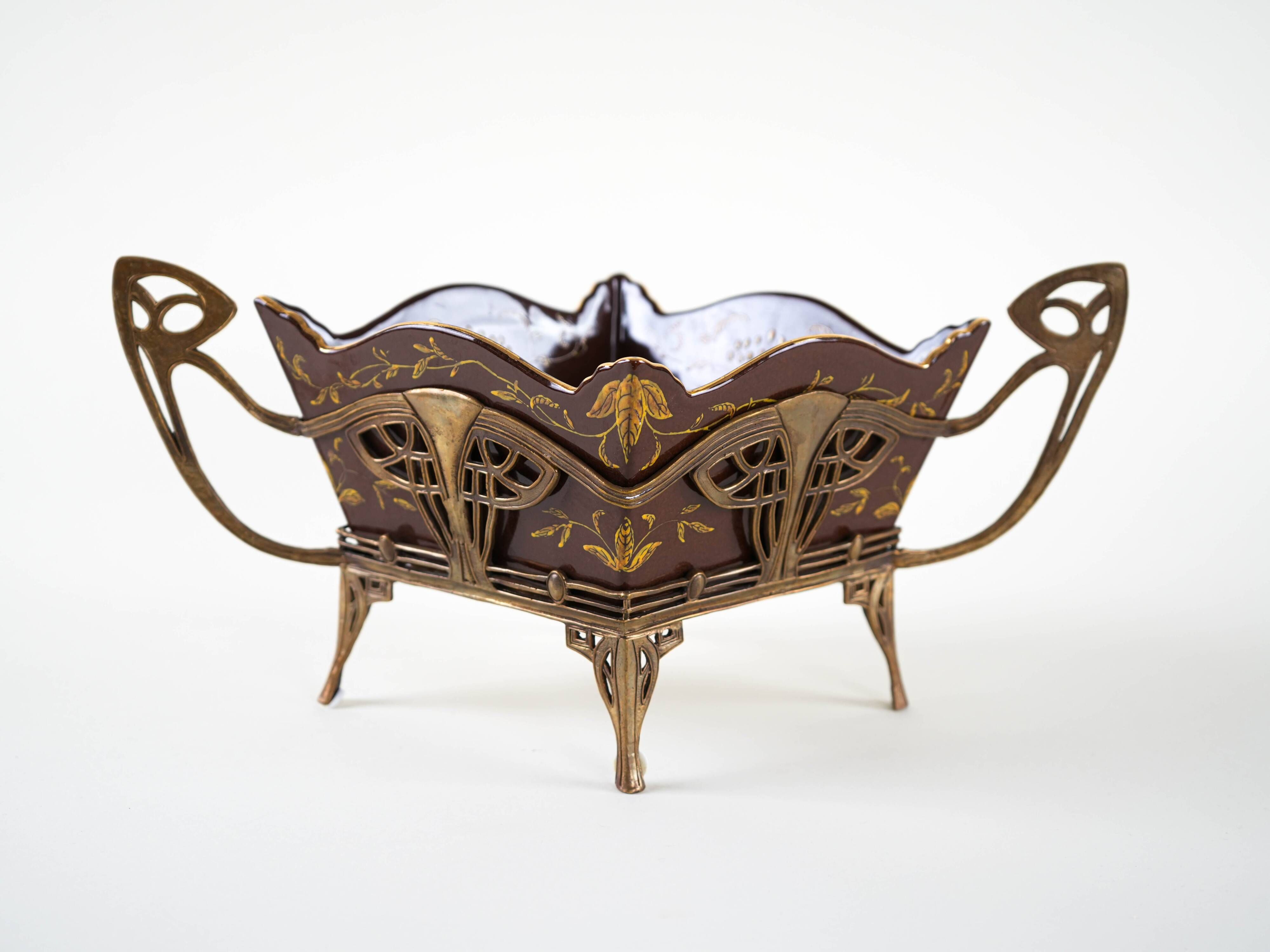Art Nouveau platter with ceramic insert in openwork metal basket, burgundy glaze with gilt accents