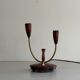 Simple double-headed table lamp in wood and brass, 1960s, Germany.