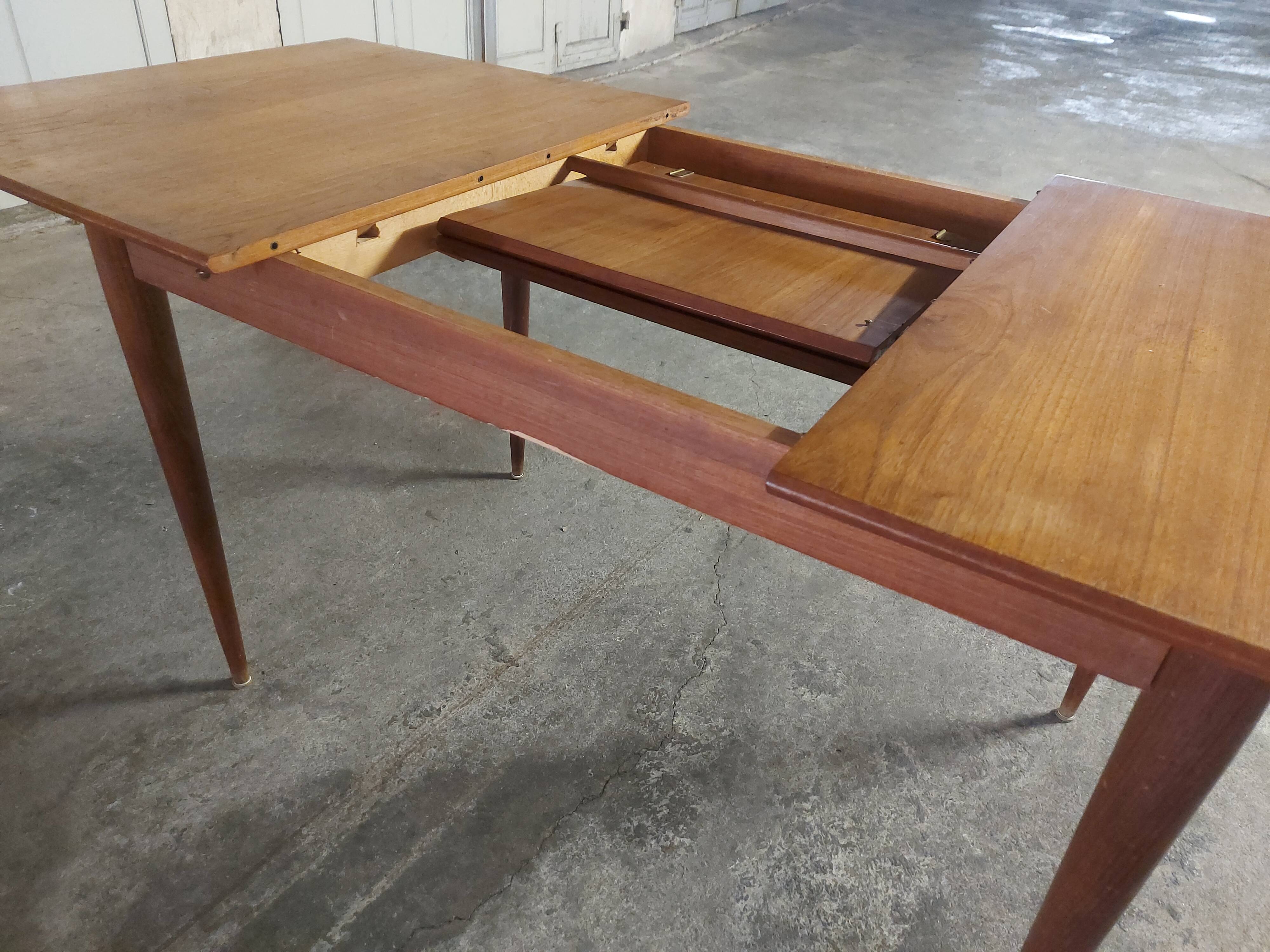 Scandinavian teak table with built-in extension