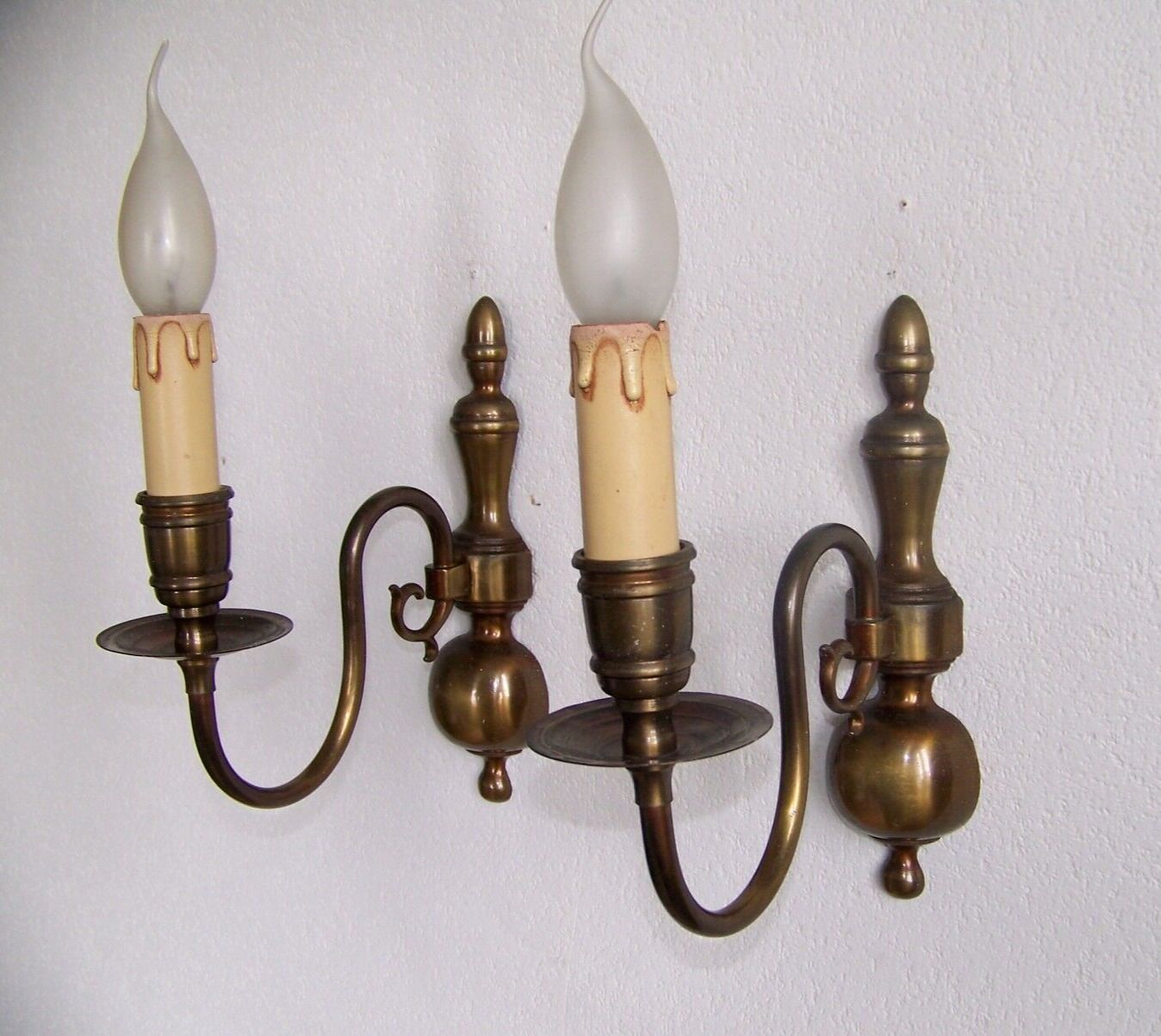 Pair of metal wall sconces