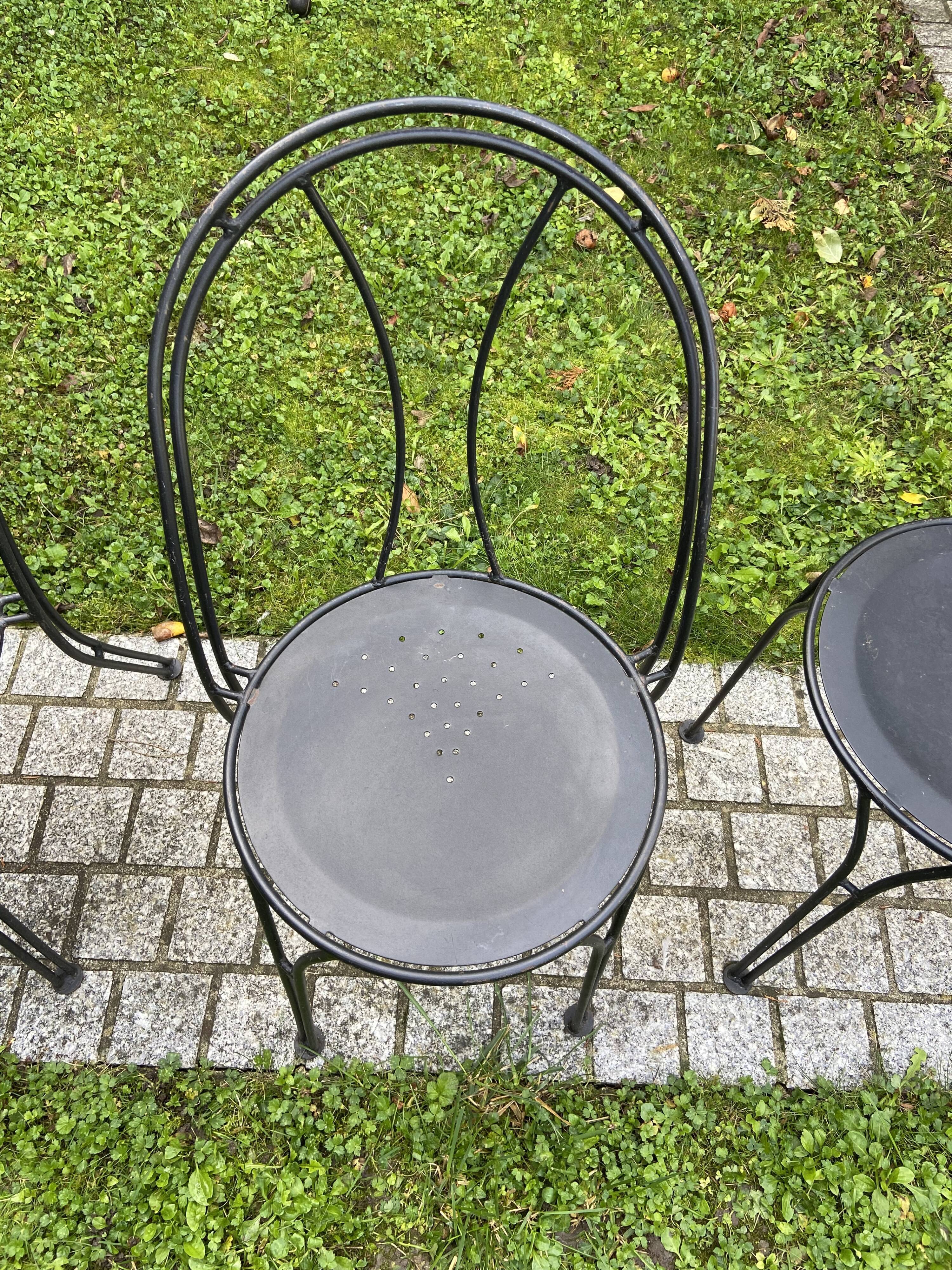 Black chair in vintage wrought iron 1980