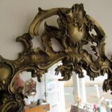 Louis XV style mirror, with bronze frame.