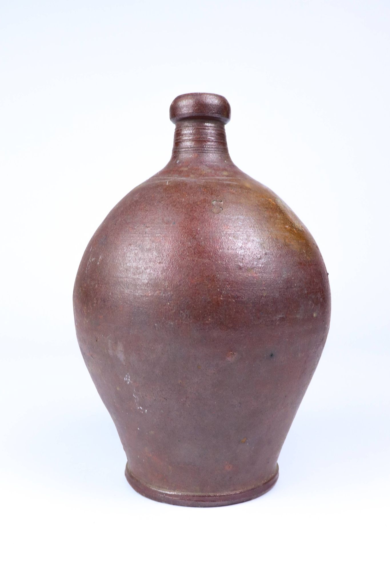 Old enamelled stoneware jug
