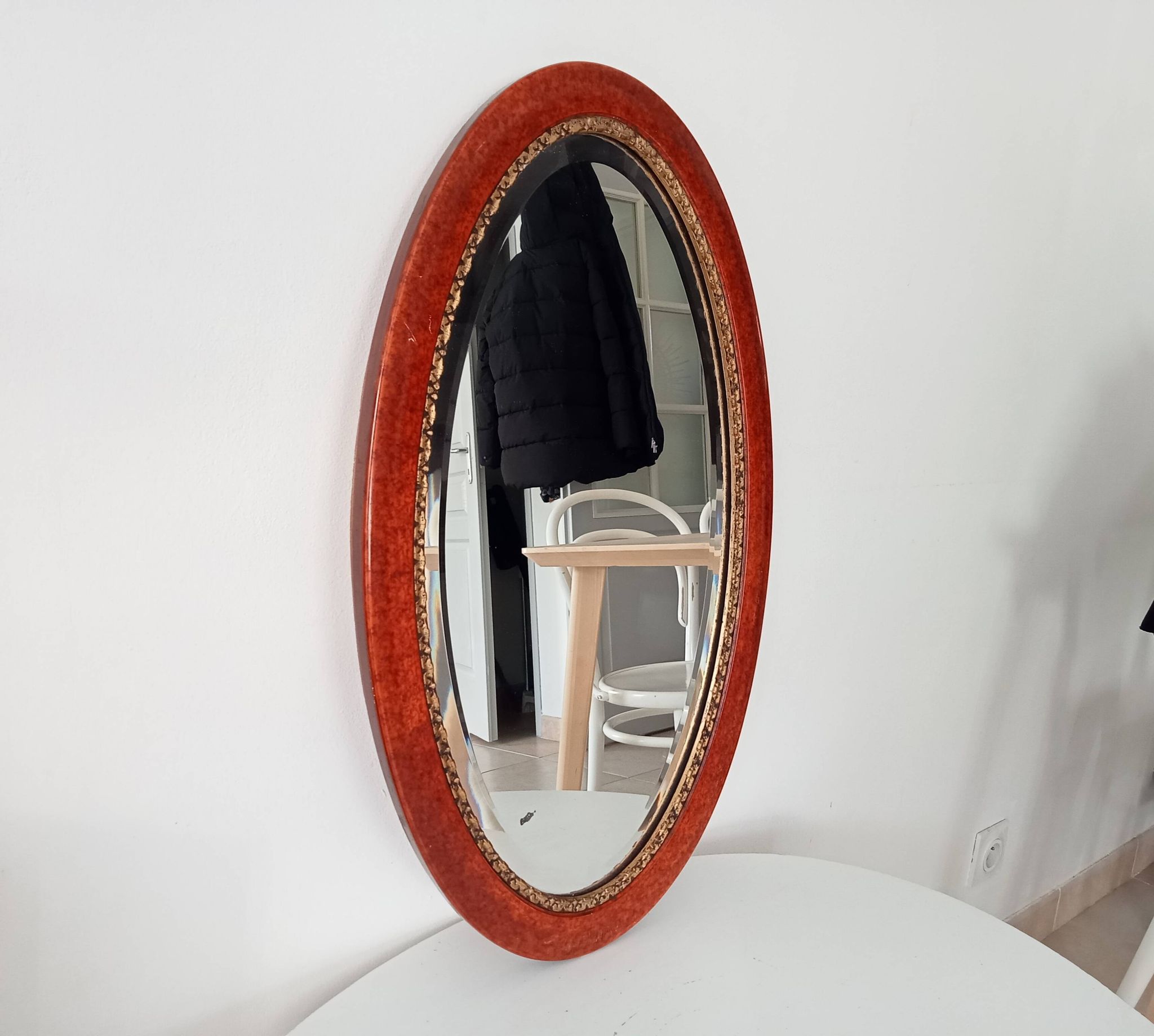 Antique oval mirror with bevelled glass