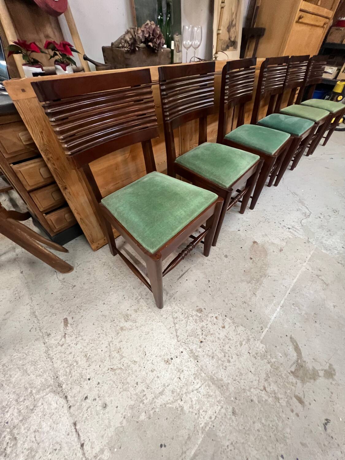 Set of 6 chairs and 2 armchairs by Gaston Poisson