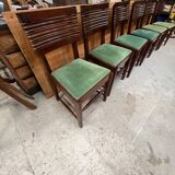 Set of 6 chairs and 2 armchairs by Gaston Poisson