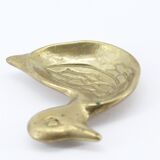 Empty brass duck bag