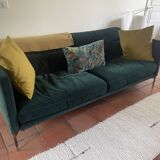 Dark green velvet sofa