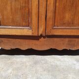 Old rustic oak cabinet of the 19th century louis 15 style