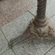 Old bistro table with marble top and cast iron base.