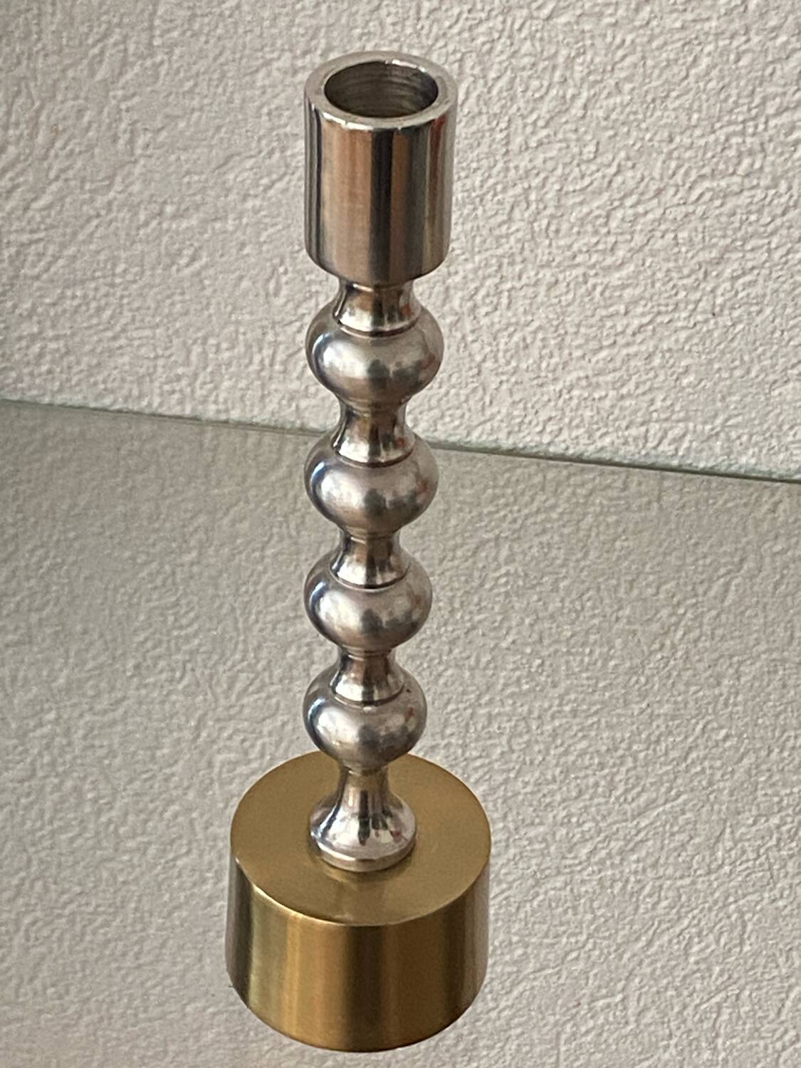 Silver and gold metal candle holder