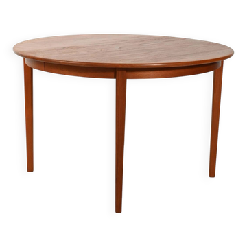 Round extendable teak table by Svante Skogh