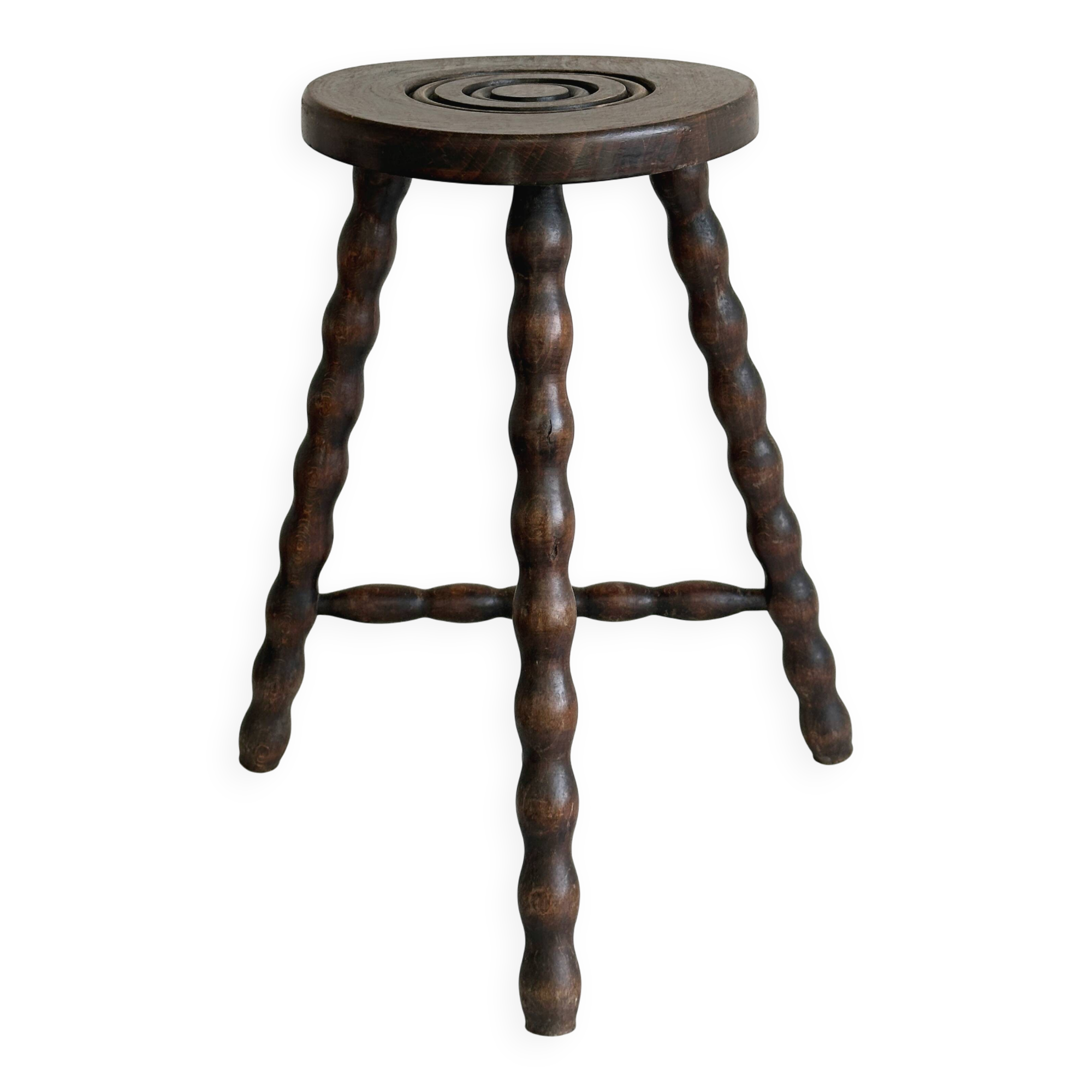 Antique three-legged twisted wooden stool