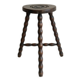 Antique three-legged twisted wooden stool