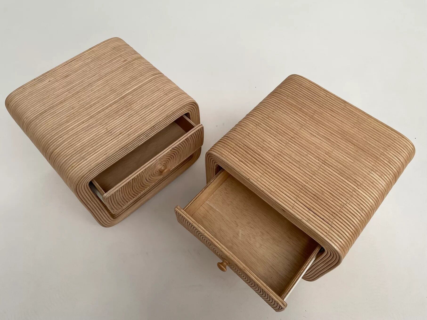Pair of rattan bedside tables