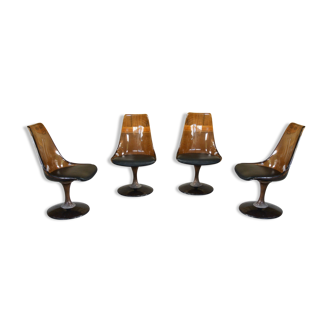 Four swivel chairs - metal base - smoked brown plexi shell - black skaï seat