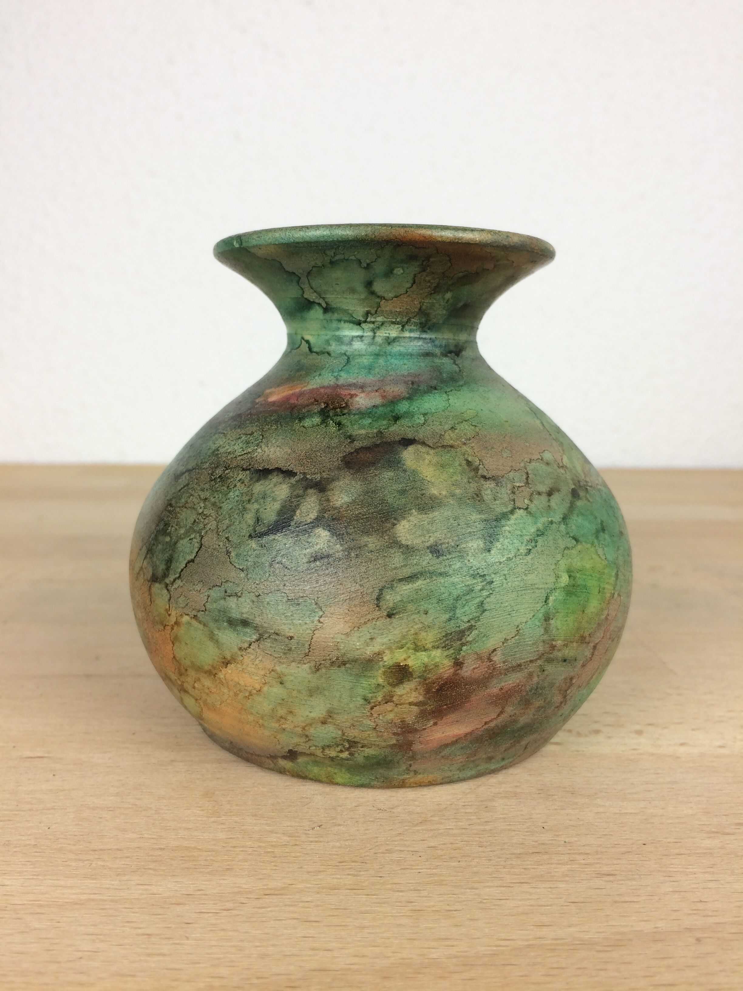 Vintage green ceramic ball vase