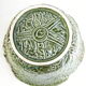 Vintage salad bowl in dabbling cabbage leaf and cutlery