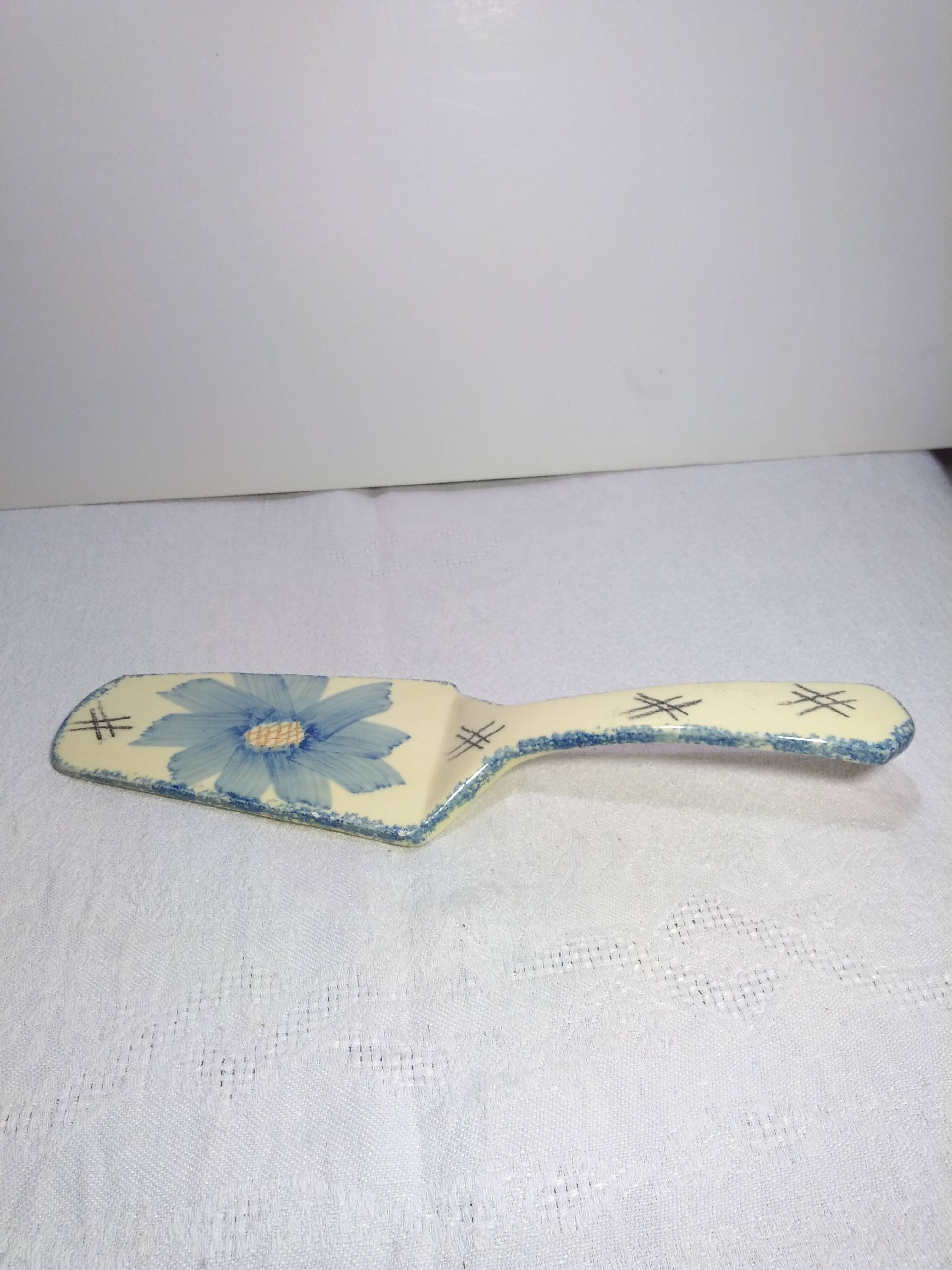 Vintage earthenware pie shovel