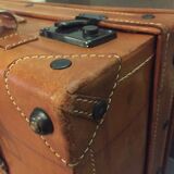 Thick leather suitcase