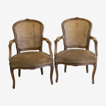 Pair of convertibles caned Louis XV style armchairs