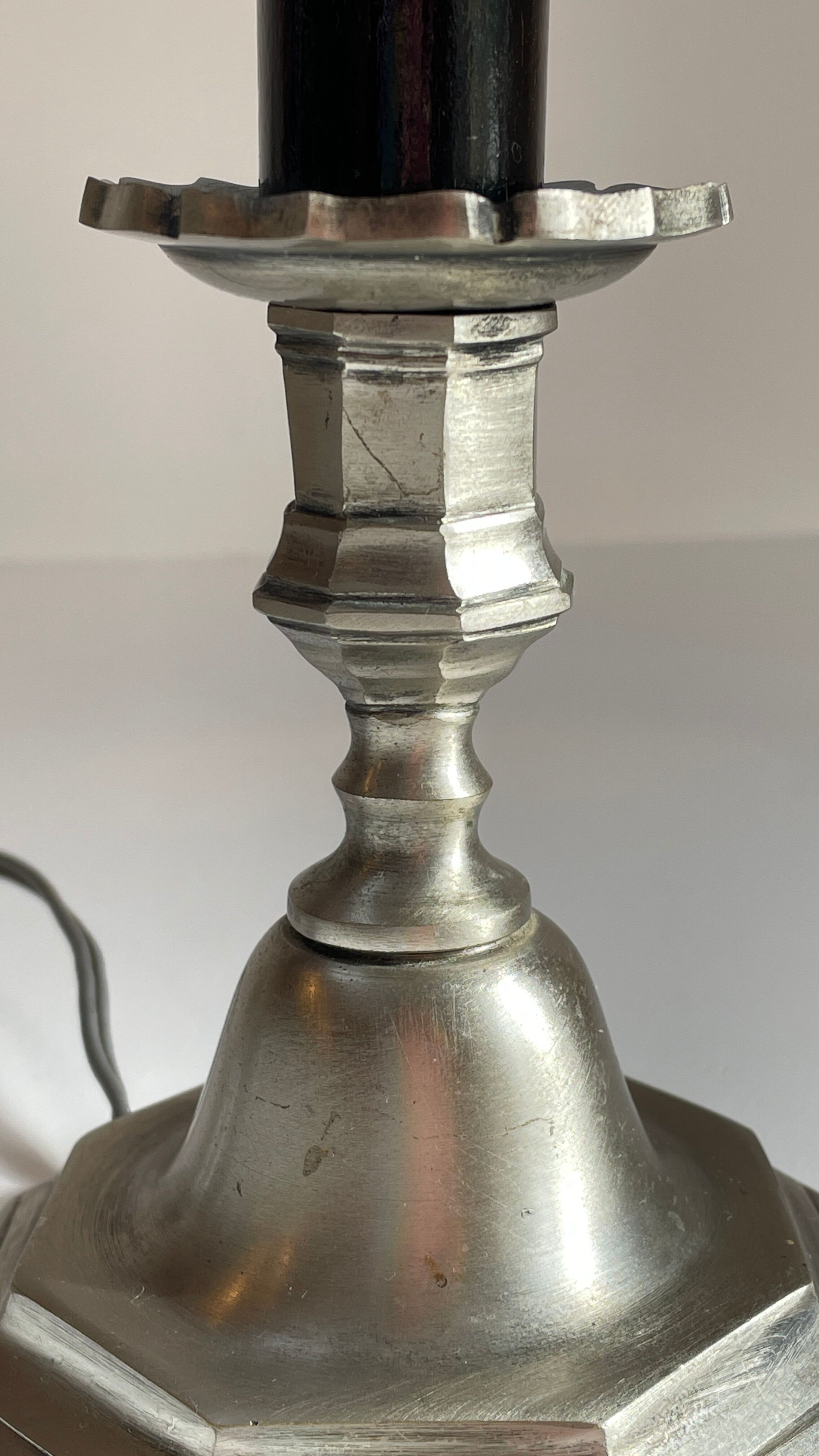 Steel candlestick lamp and grey velvet
