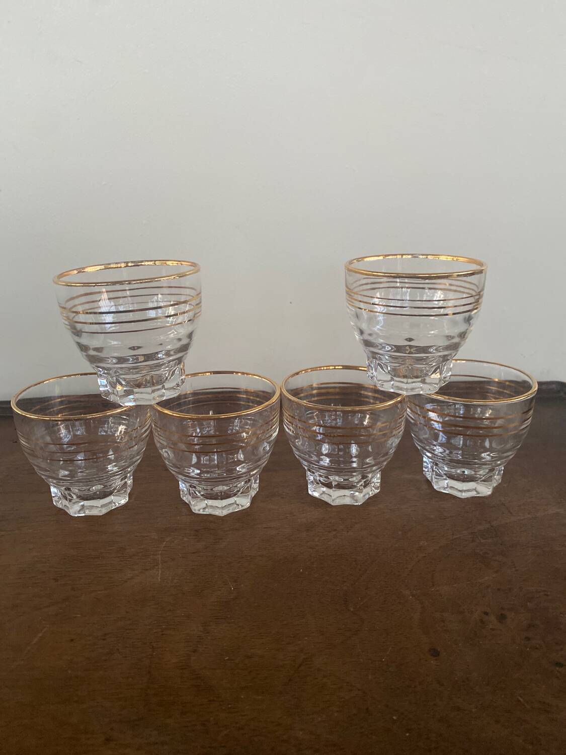 6 small golden glasses