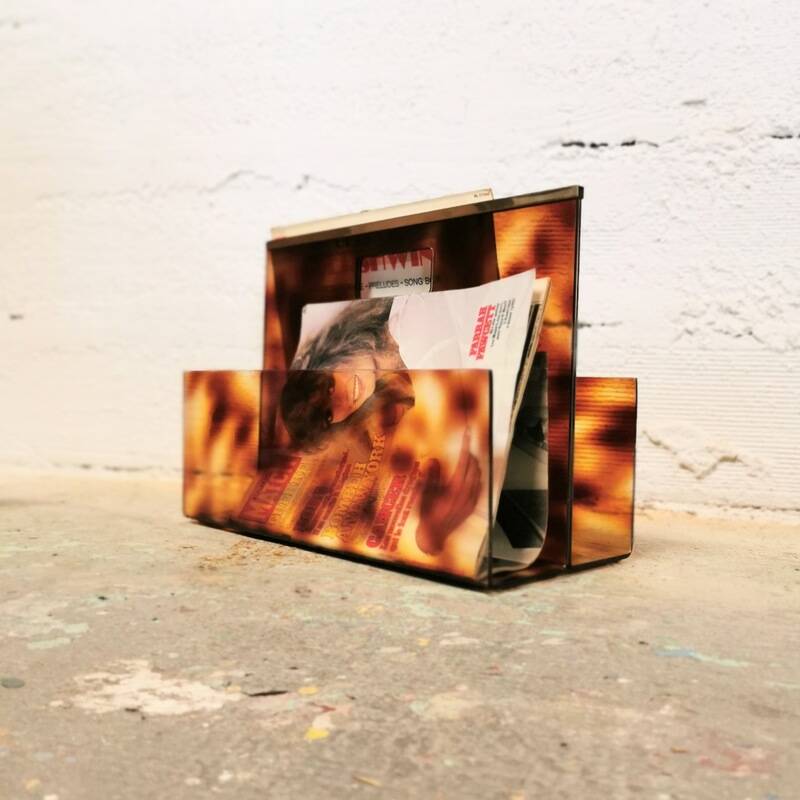 Vintage magazine rack in plexiglass and brass