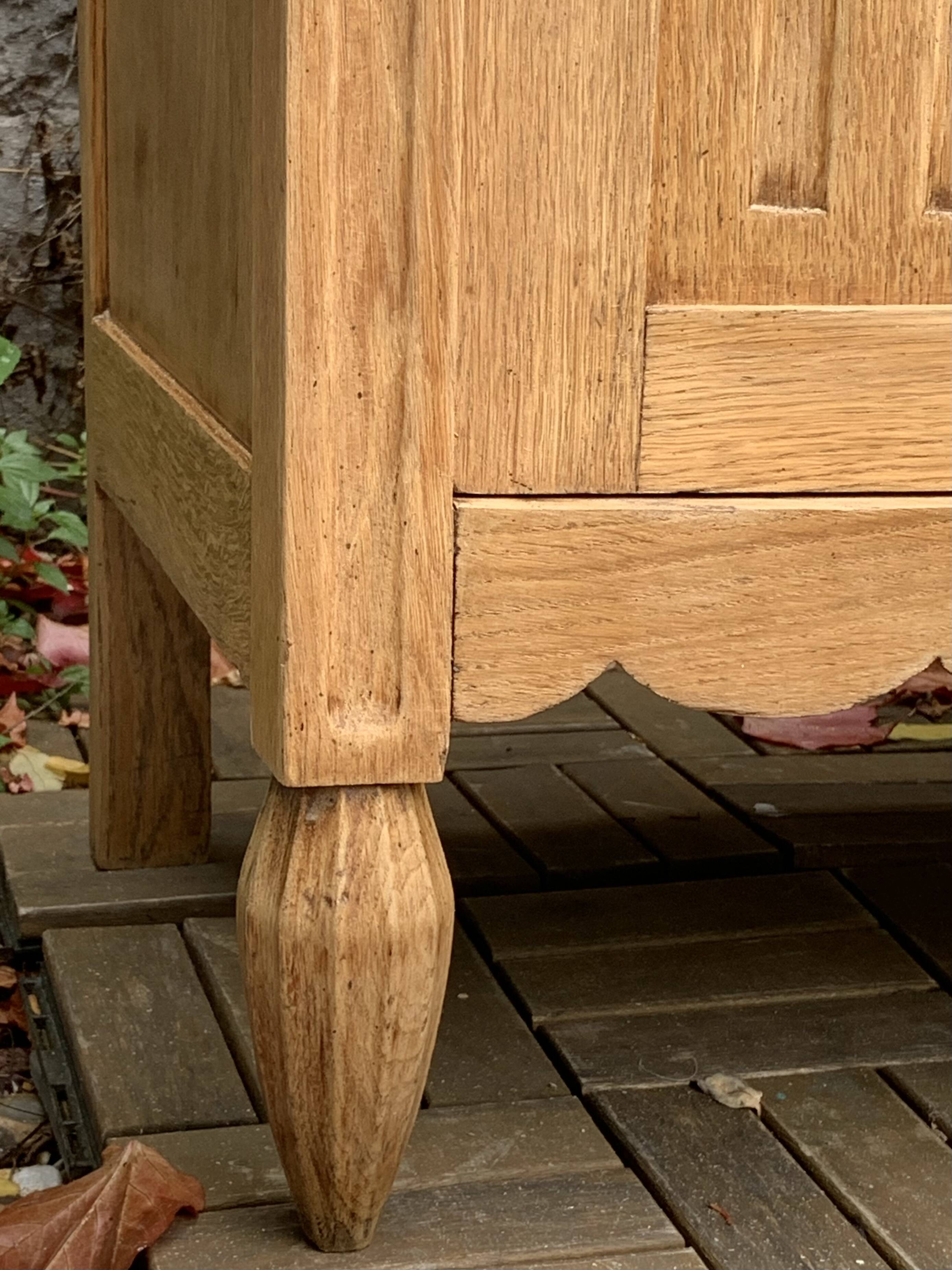 Parisian Art Deco asymmetrical glass cabinet in raw oak, 1930