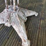 Old cast iron art-deco garden table