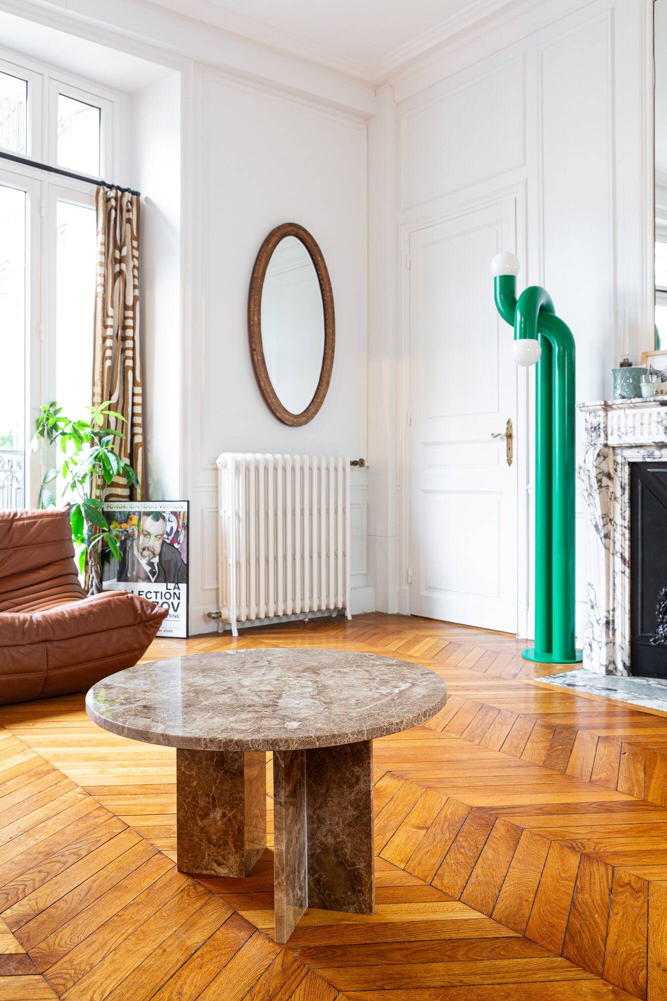 Round table in beige marble