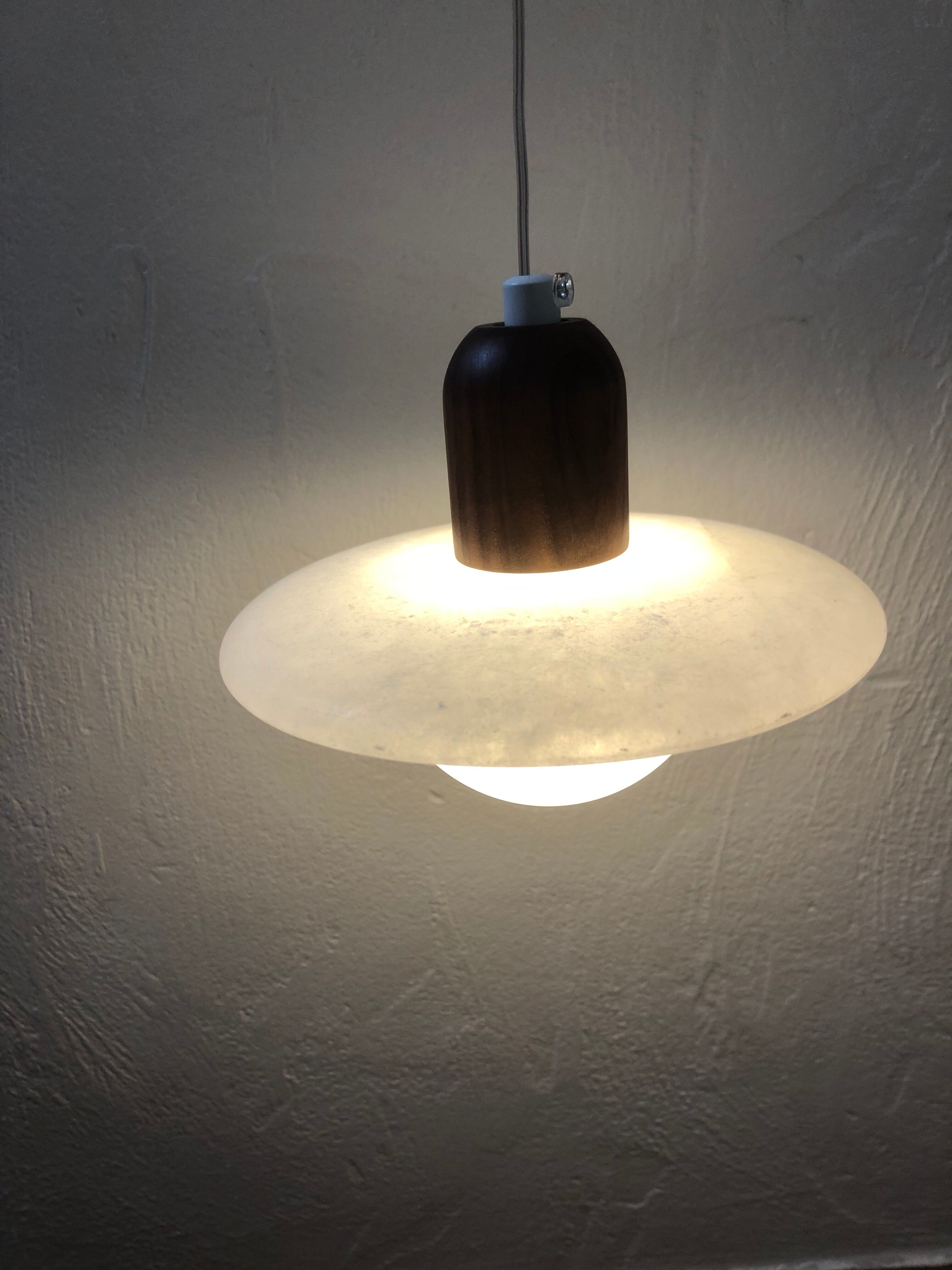 Pair of onyx and walnut suspended light fixtures
