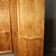Large cherry wood folding screen with four double-sided panels.