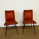Pair of chairs in orange skaï