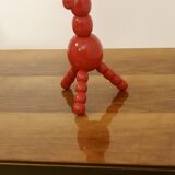 Pair of red wooden candelabra from Sweden 1970