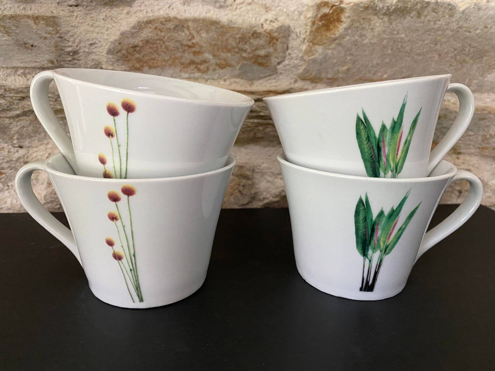 4 fine white porcelain cups with fine flower decoration