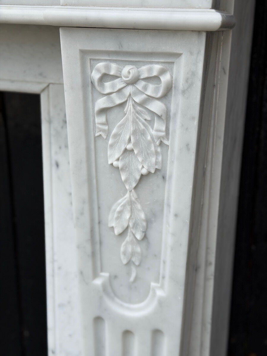 Louis XVI style fireplace in Carrara marble, circa 1880.