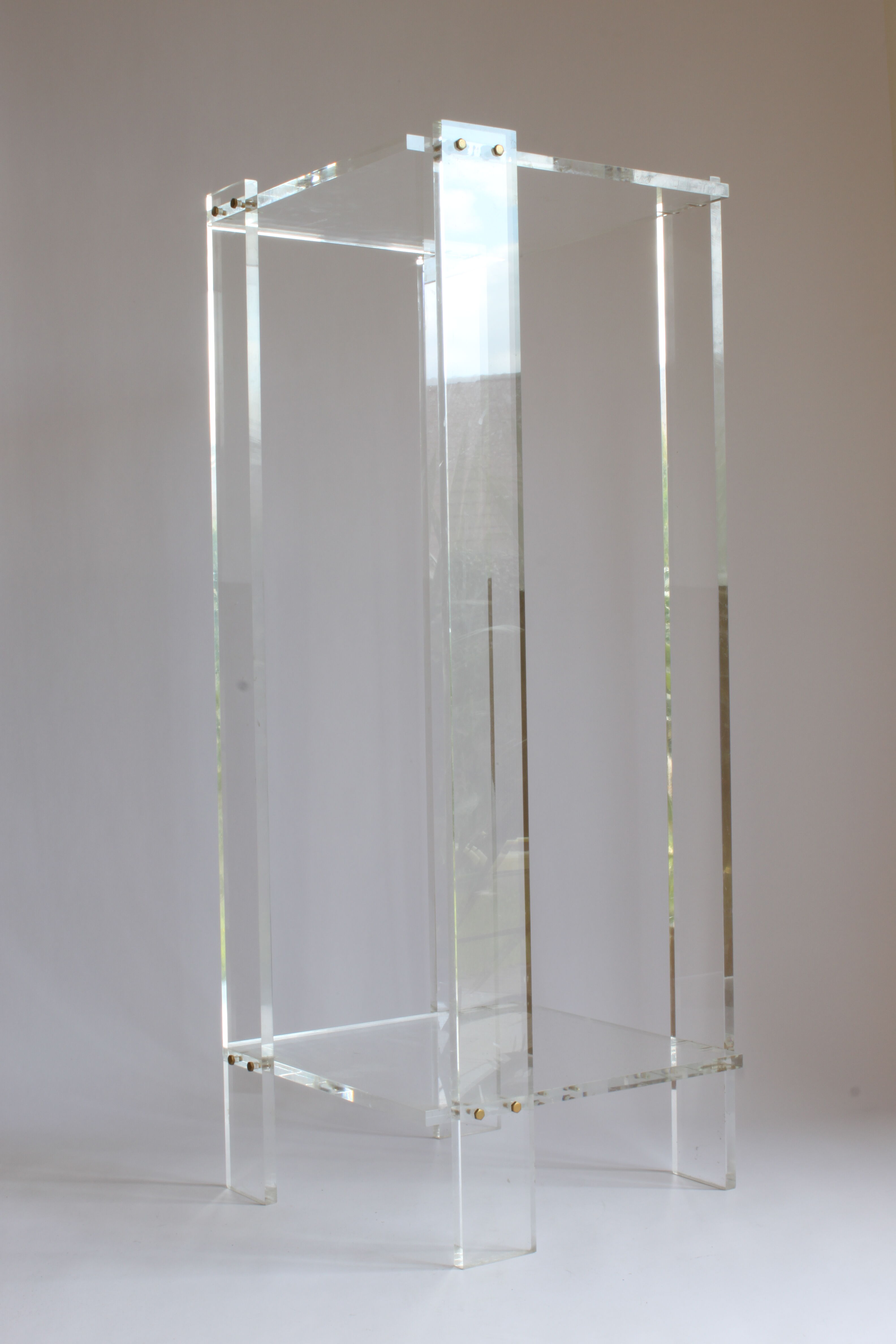 Tall lucite sidetable, 1970s.