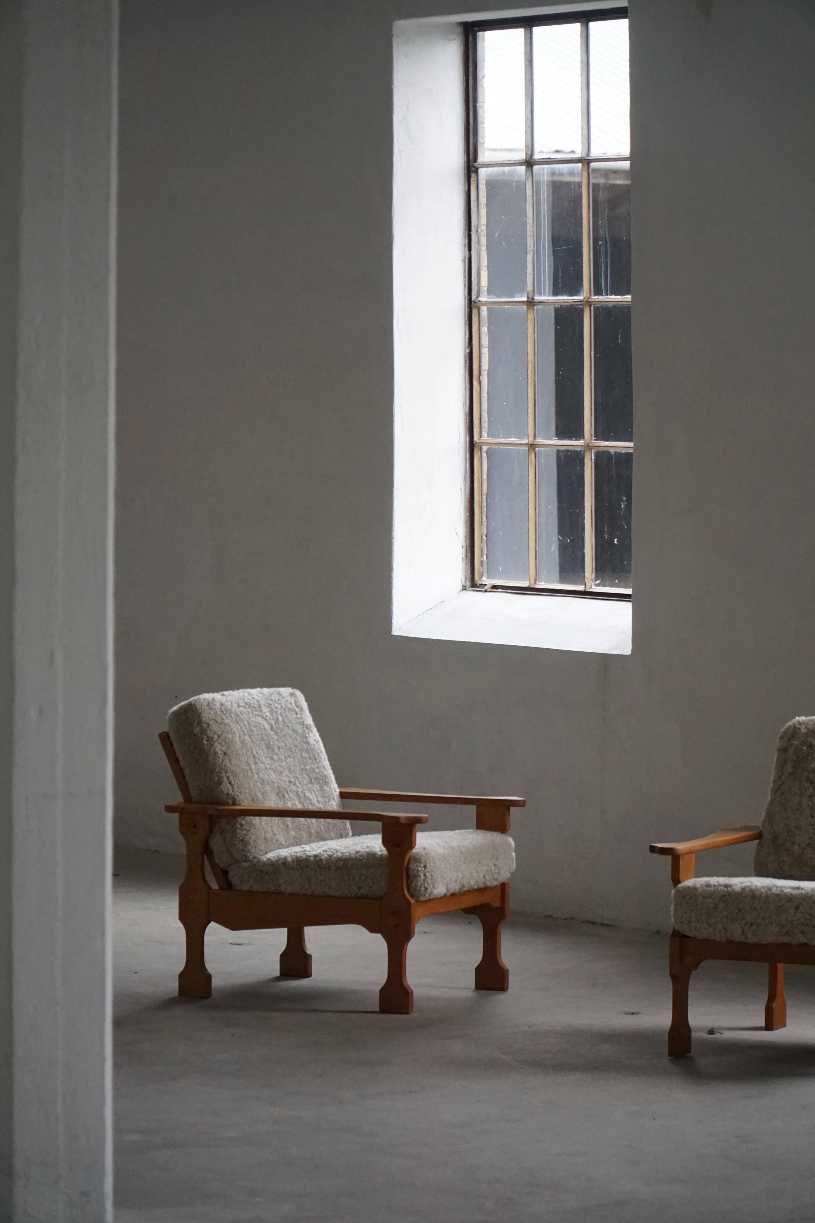 Modern Danish, Pair of Lounge Armchairs in Oak and Lambswool, Henning Kjærnulf, 1960s
