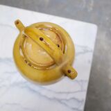 Old gargoulette pot in glazed terracotta