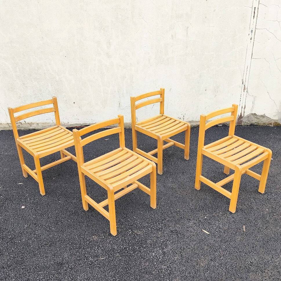 Set of 4 varnished wooden chairs, André Sornay